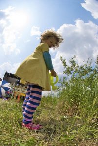 Photograph of girl gardening