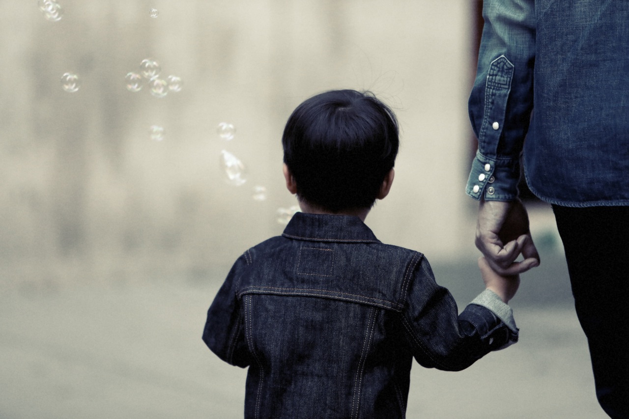 Photo of child with bubbles