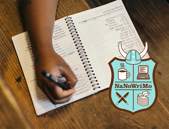 person writing in notebook with NaNoWriMo logo
