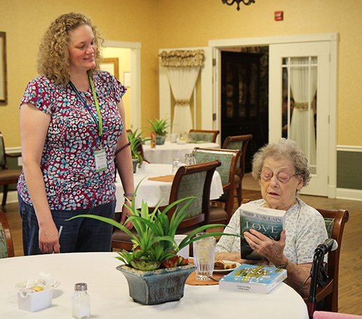 library staff delivering books to retirement community