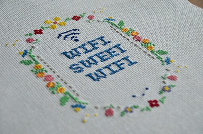 Cross stitch that says "Wifi Sweet Wifi"