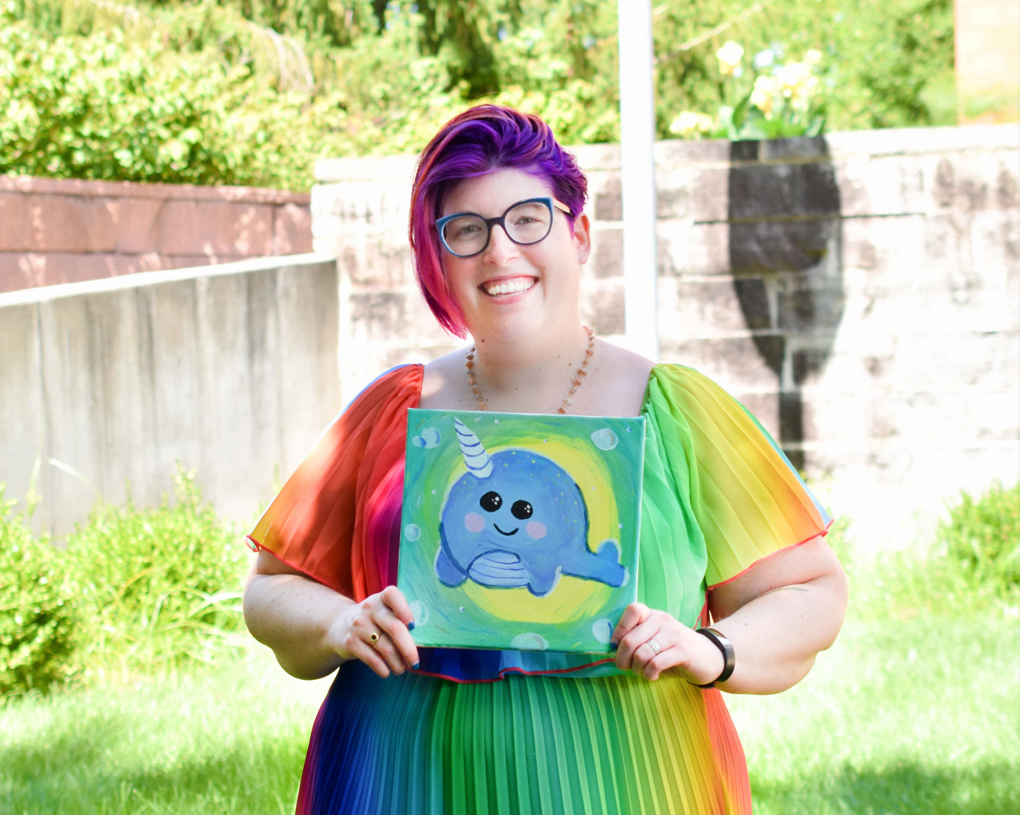 Megan with narwhal painting.