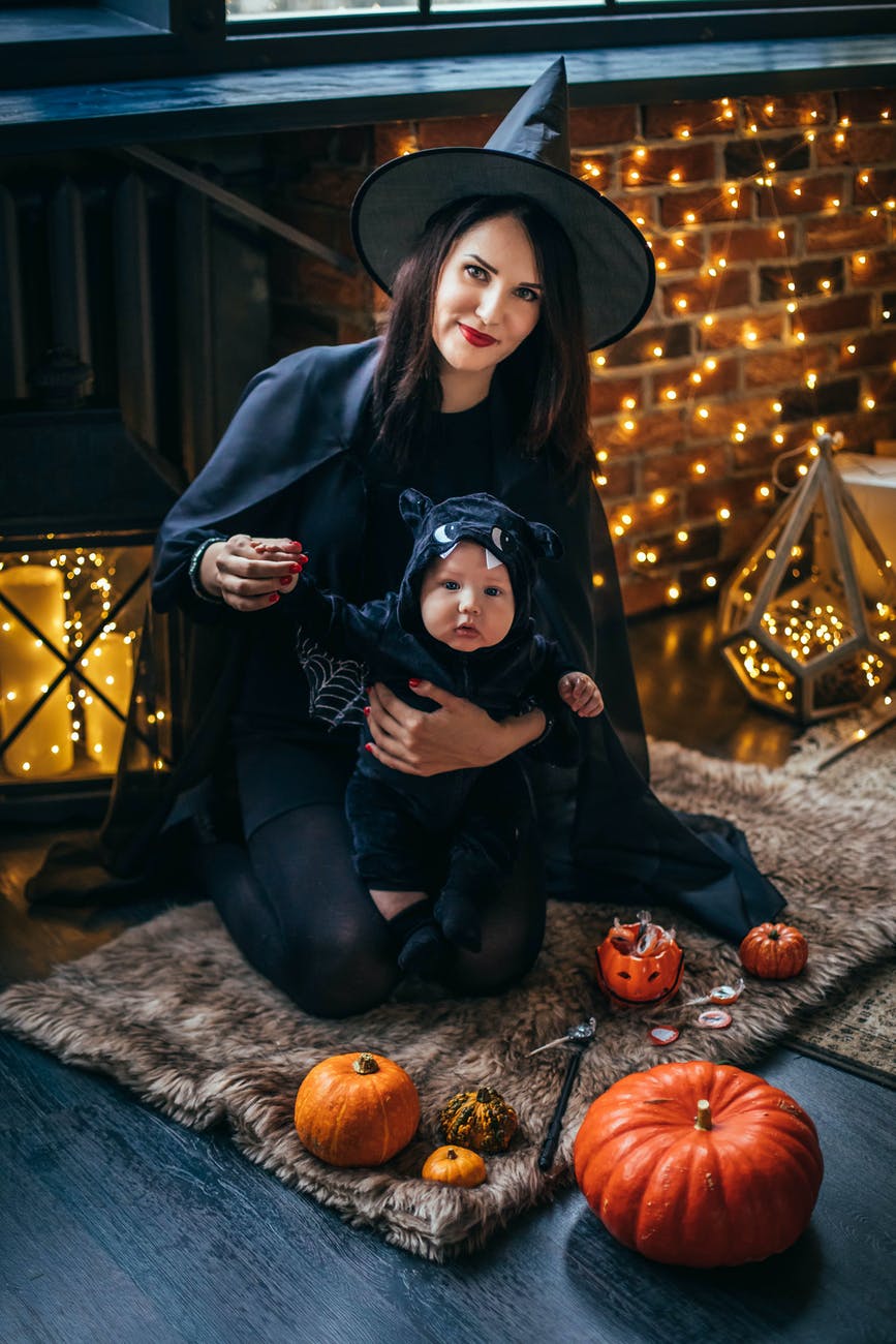 Mother and child in witch costume