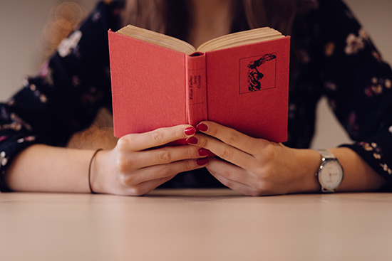 woman reading book