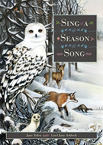 Cover of the book Sing A Season Song. A forest scene in winter with snowy owl, fox, deer, ferret, and otter.