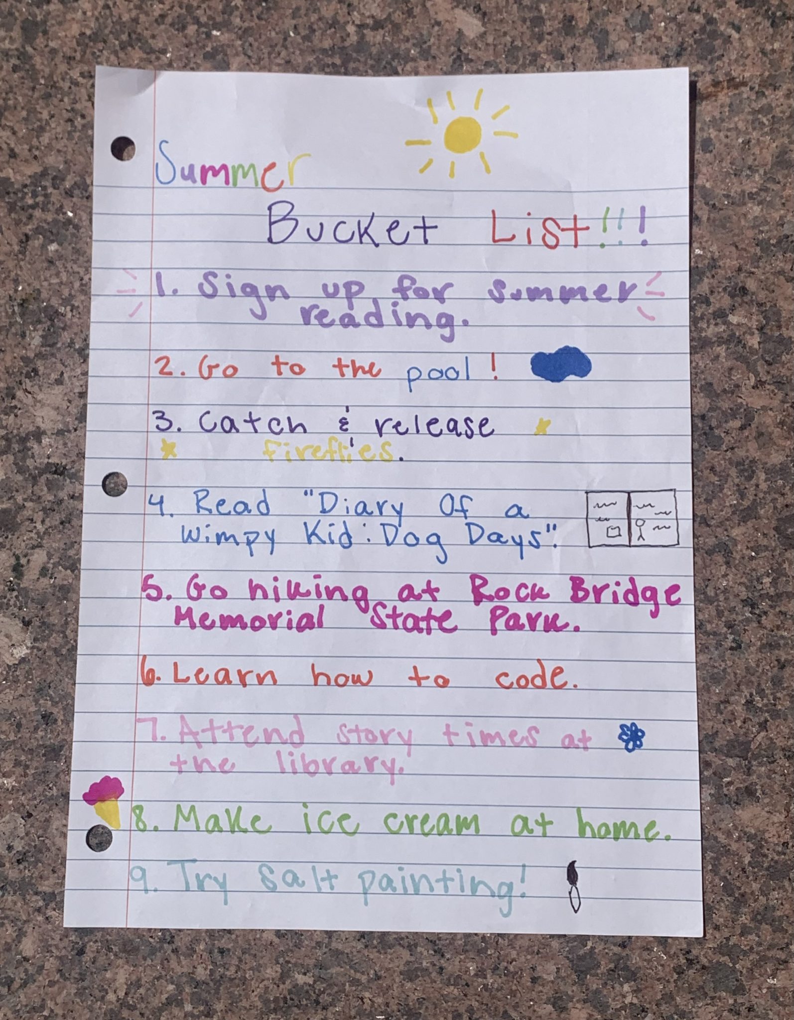 Photo of a paper that displays a summer bucket list.