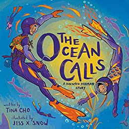 The cover of the book "The Ocean Calls" features a old woman and a young girl in wetsuits, masks and flippers beneath the ocean. They are surrounded by orange fish and mermaids. 