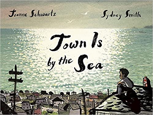 The cover of the book "Town Is By the Sea" features a young boy sitting on the roof of his house overlooking an industrial seaside town and the sparkling ocean beyond.