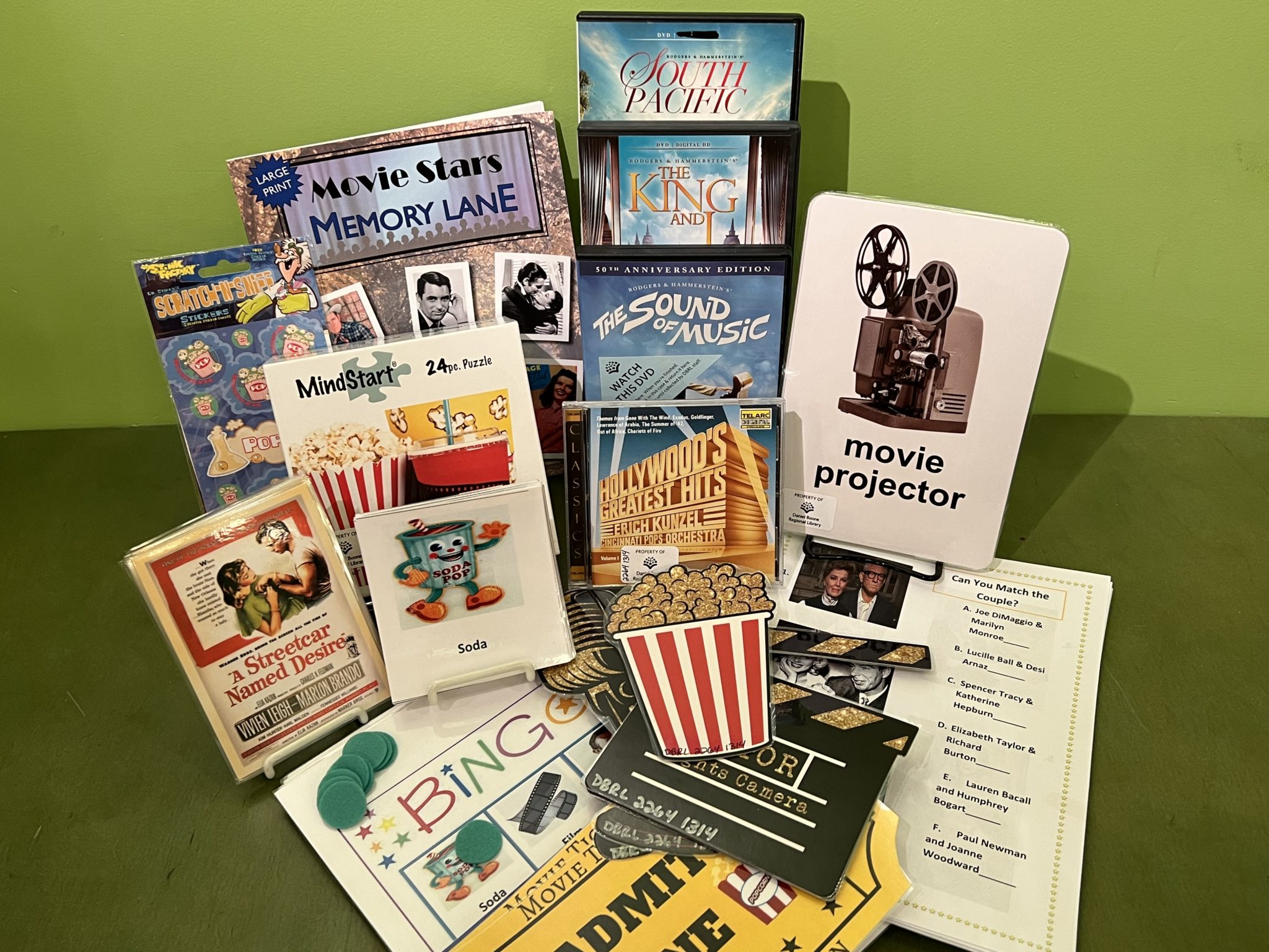 collection of books and other library materials with a movie theme