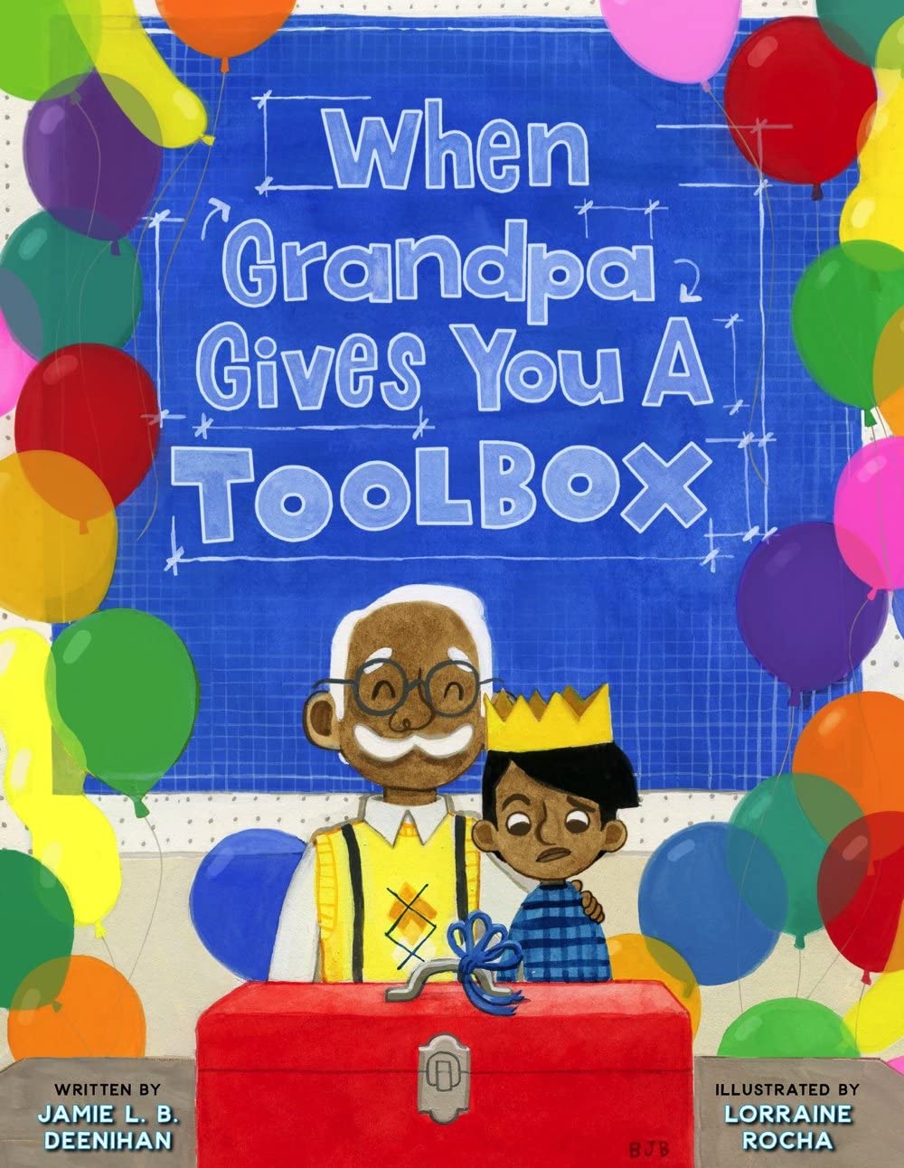 The cover of the picture book "When Grandpa Gives You a Toolbox" features a grandfather with his arm around his grandson. They are looking down at a big red toolbox in front of them. The grandfather smiles while the grandson doesn't look so happy. They are surrounded by balloons, and the background looks like a building blueprint.