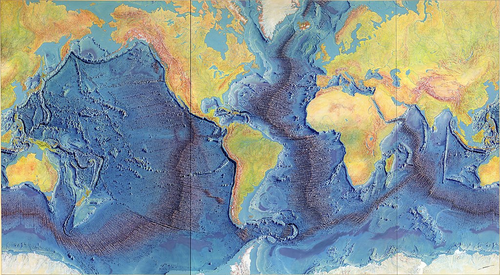 A hand-painted map depicting the topography of the ocean floors and continents