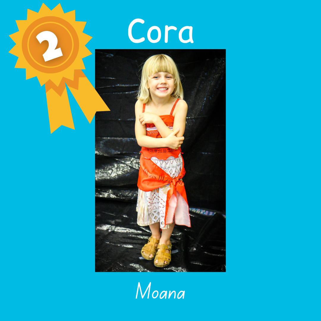 2nd place Cora as Moana. Photo of a small child in a red and white sundress.