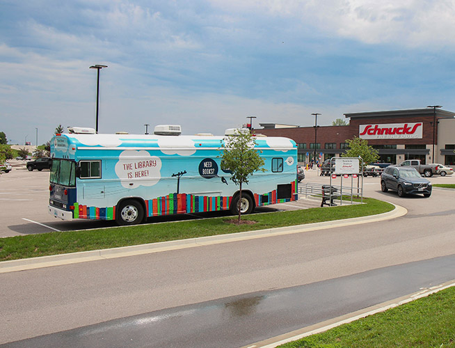 the big bookmobile at the Battle Crossing Shopping Center in front of Schnucks