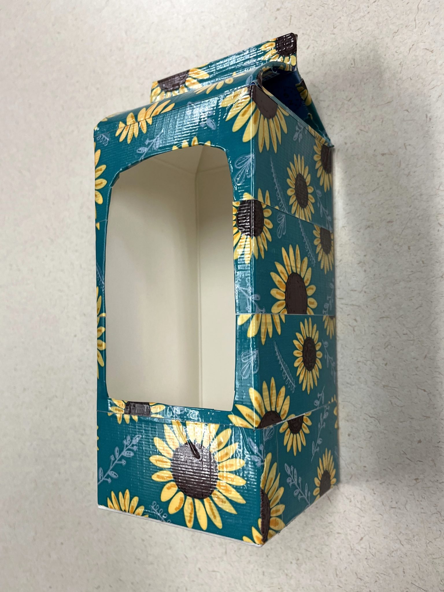 Bird feeder wrapped in duct tape