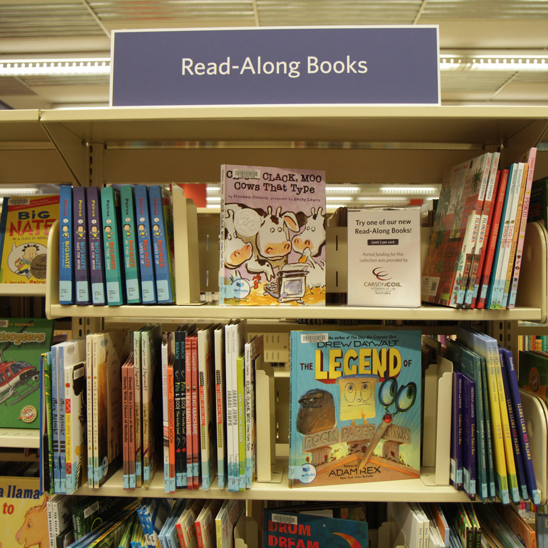 read-along books are shown on a library book shelf