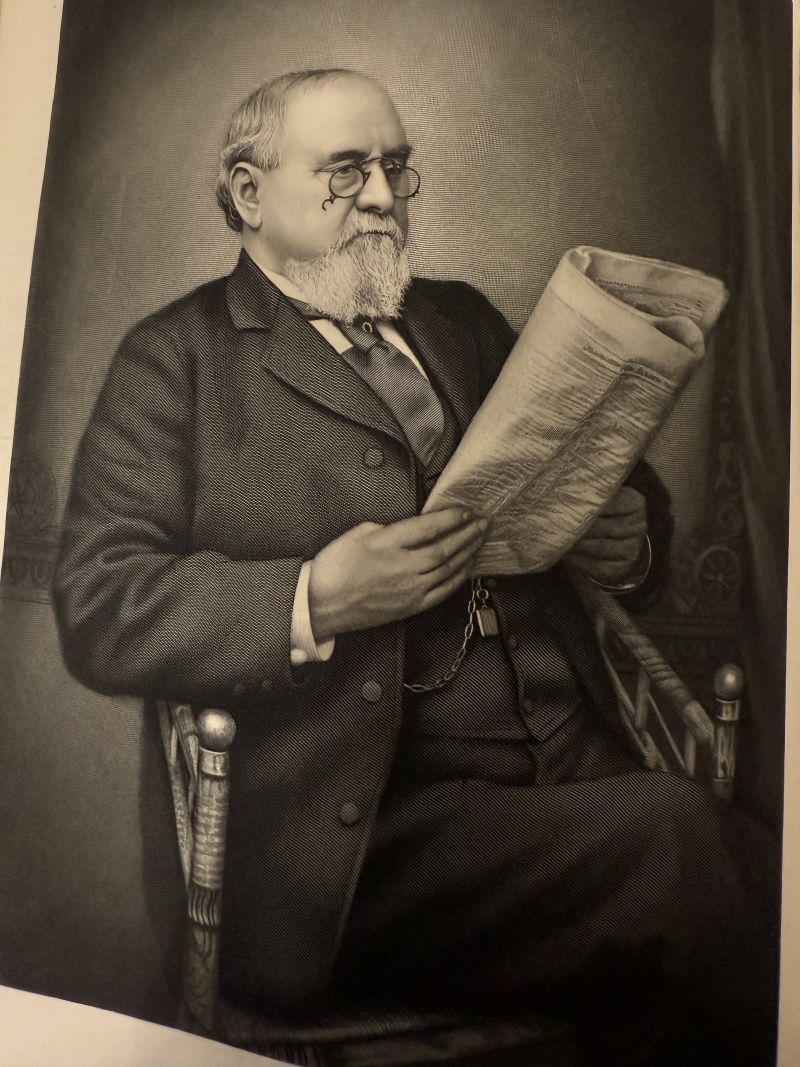 A stylized engraving of Daniel Dulany, sitting in a chair and reading a paper.