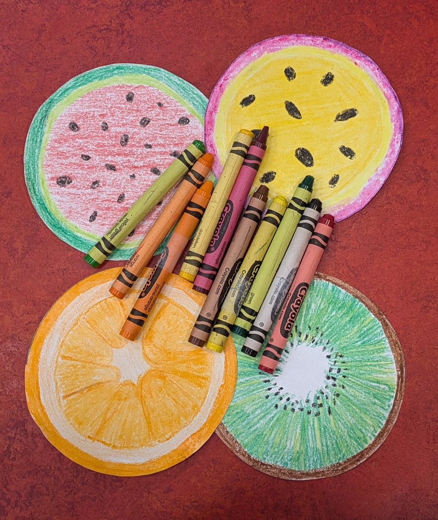 Circles colored into fruit. 