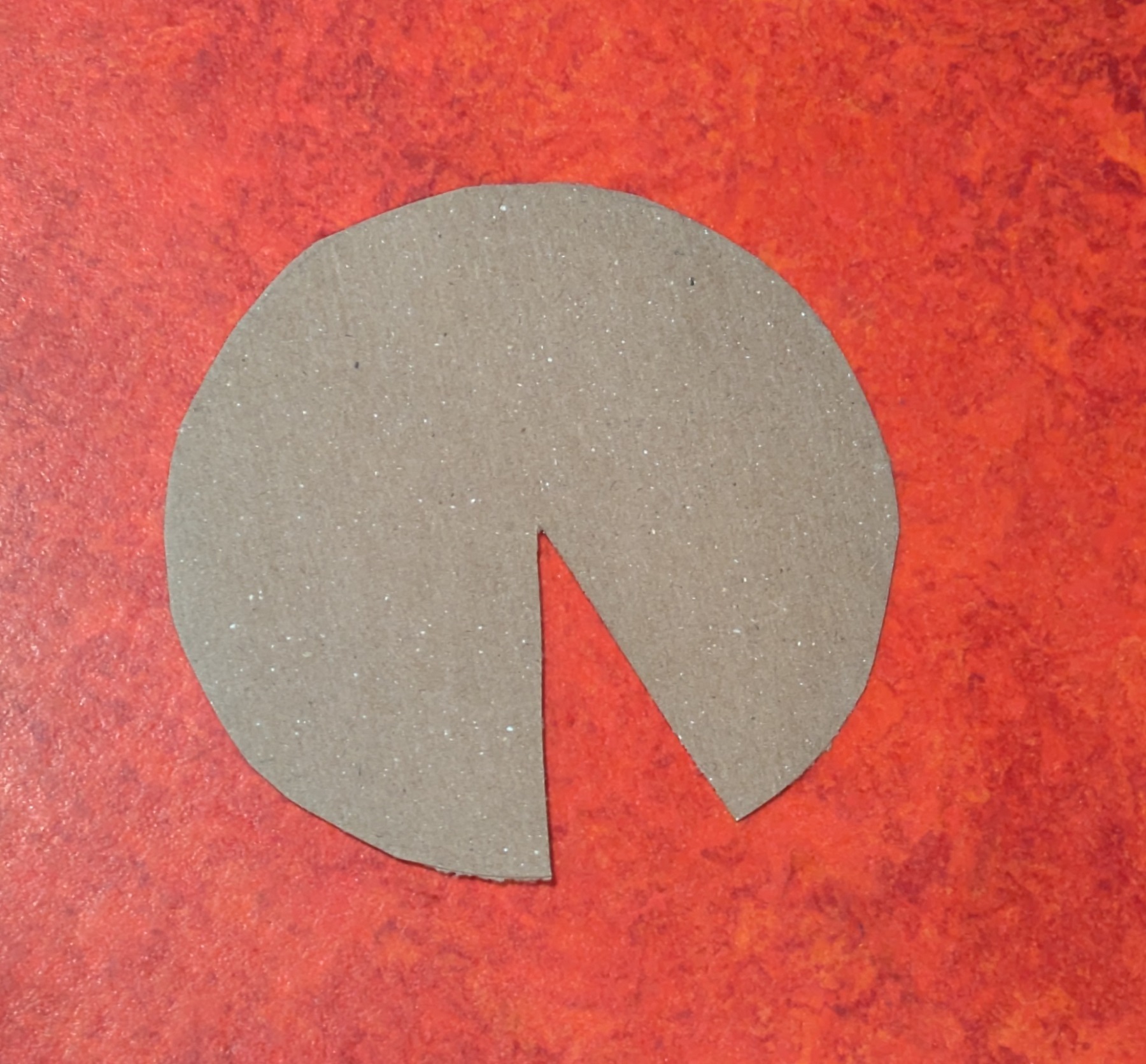 Cardboard circle with notch cut out