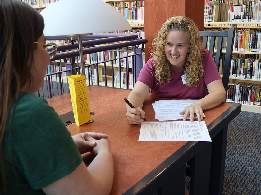 DBRL's Community Resource Manager helping a patron