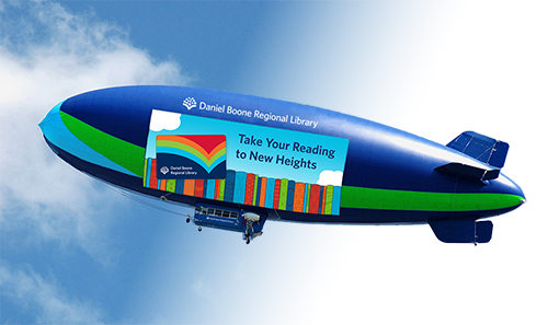 A blimp with a DBRL library card and "Take Your Reading to New Heights" [April Fools']