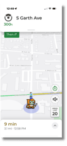 This screen capture of MapQuest shows a map of streets around the Columbia Public Library, icons for speed, volume control, arrival time, and a warrior icon representing the user.